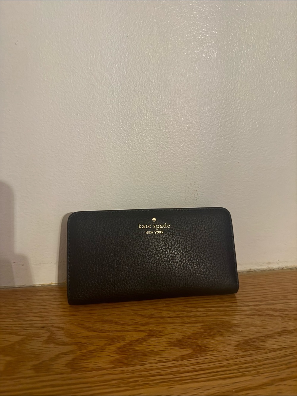 kate spade Black Pebbled Leather Zip-Around Wallet with Gold Logo